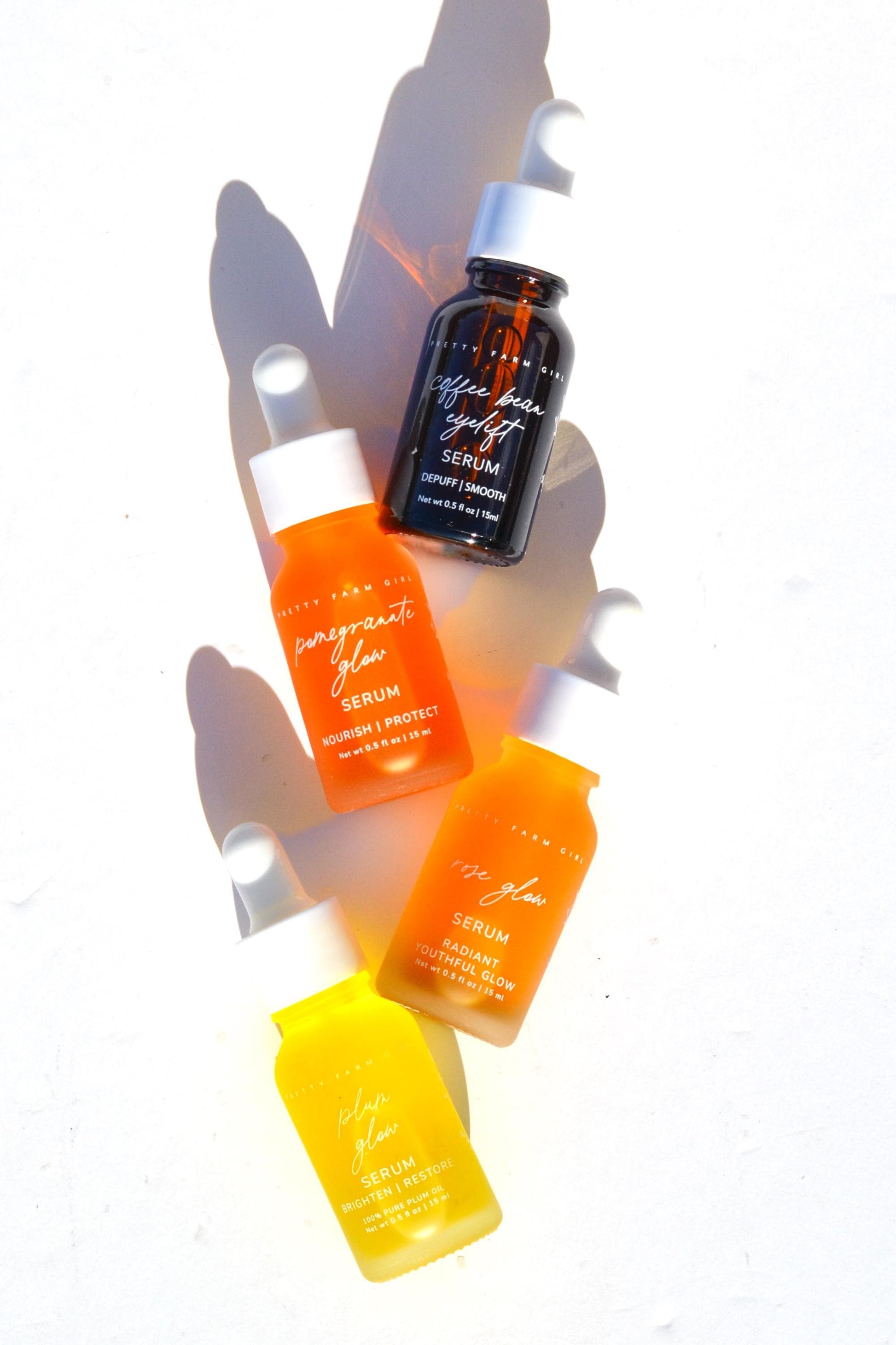 Revitalize Your Skin with the Daily Glow Serum Kit - Featuring Pomegranate, Coffee Bean, Plum, and Rose Glow Serums